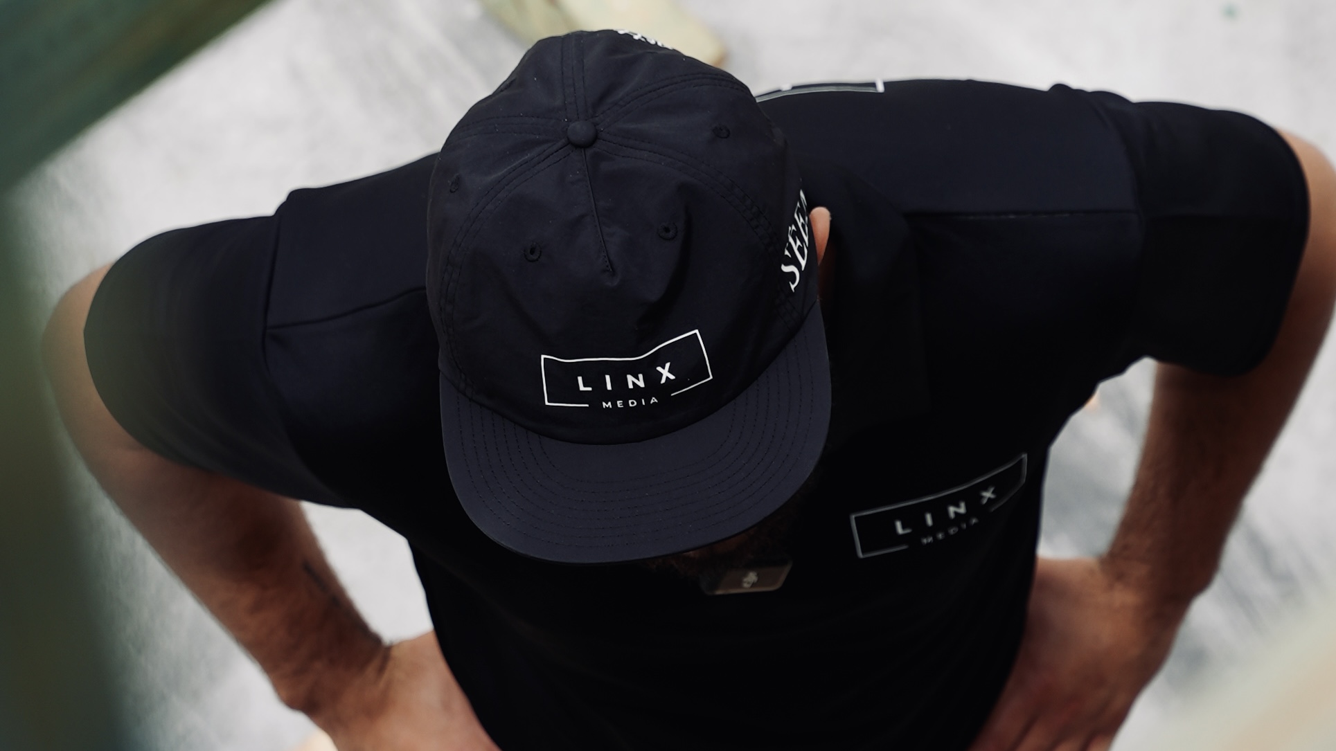 Linx Media branded cap and shirt on a Gold Coast site