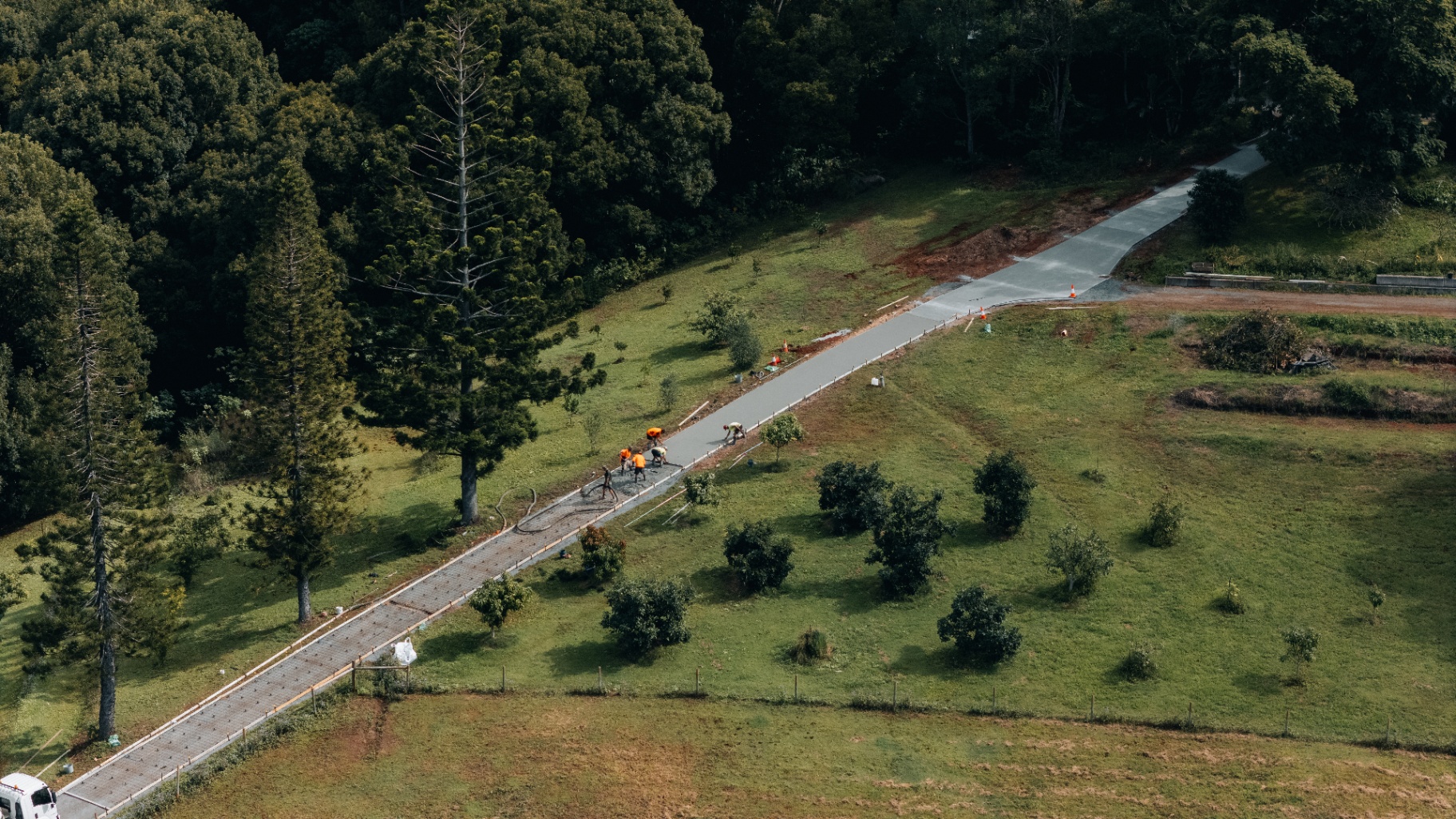 Aerial view of a concrete driveway being poured