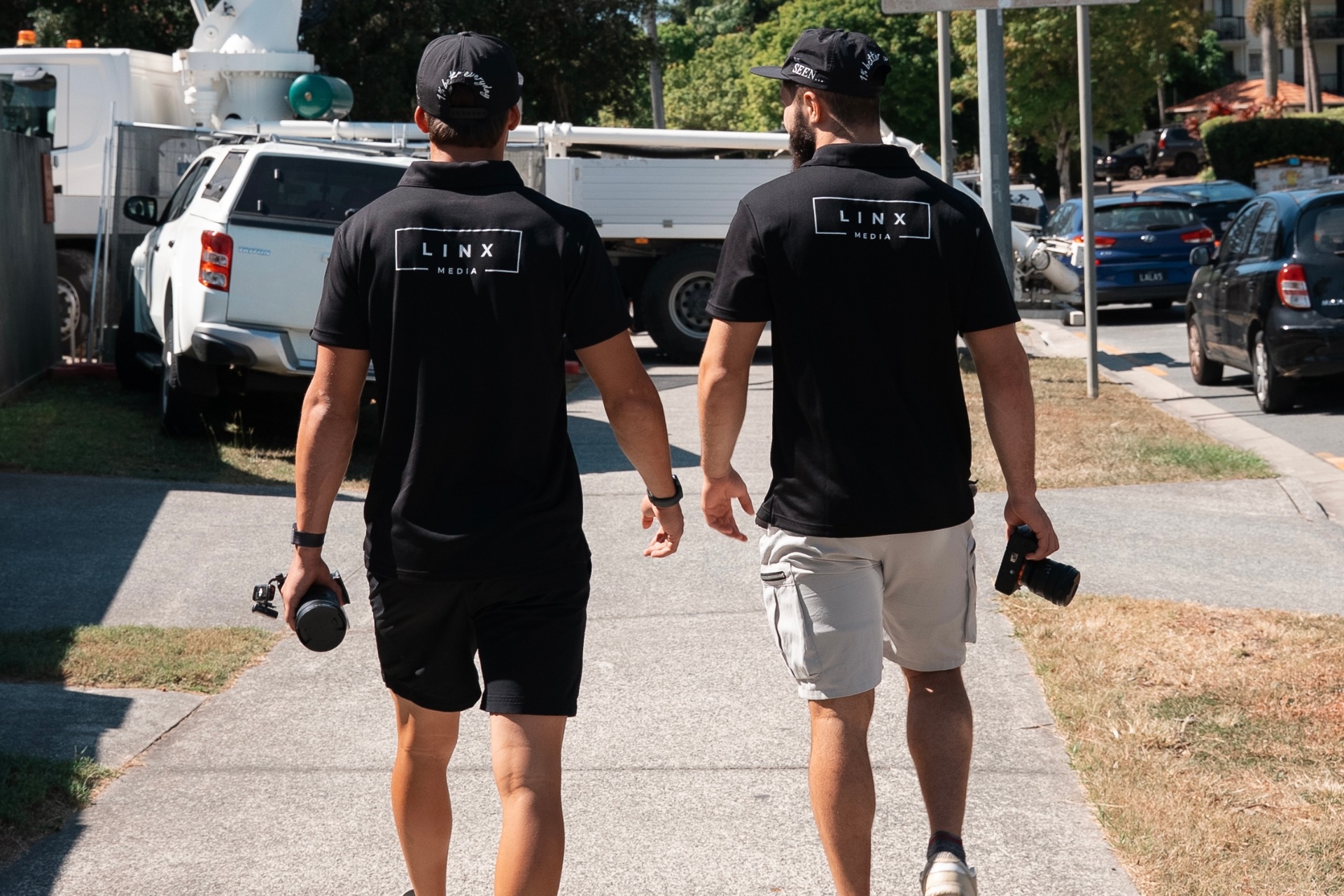 Riley Baharov and Jhai Organ, Linx Media founders, on a Gold Coast site